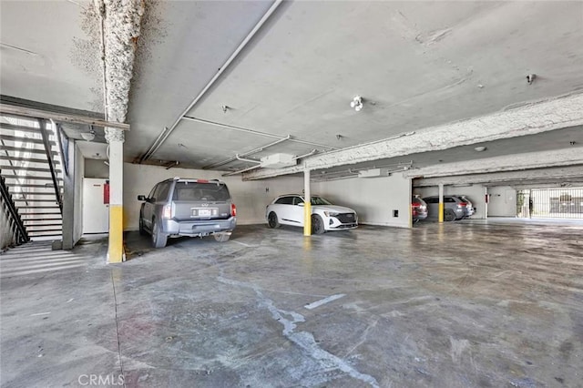 parking deck featuring a garage door opener