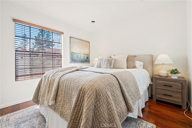 bedroom featuring recessed lighting, baseboards, and wood finished floors