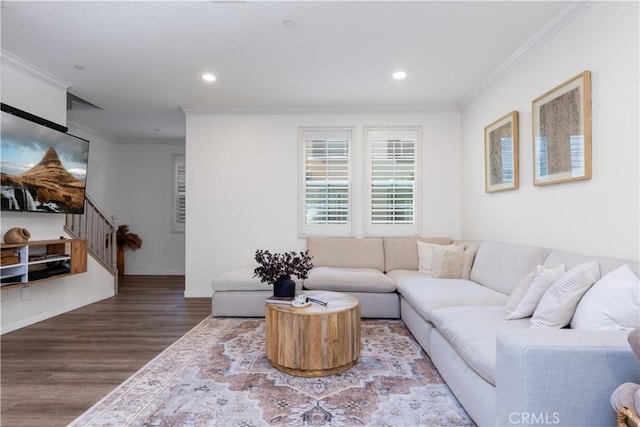 living area featuring recessed lighting, stairway, wood finished floors, and crown molding