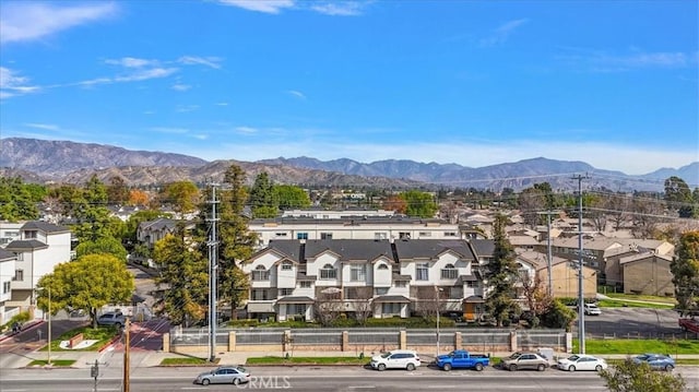 birds eye view of property featuring a residential view and a mountain view