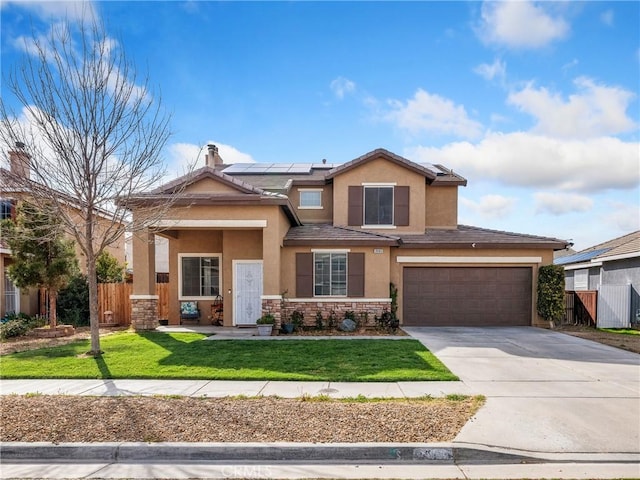 view of front of home with stucco siding, a front lawn, stone siding, fence, and concrete driveway