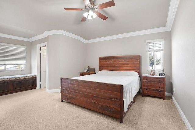 bedroom with light colored carpet, baseboards, and multiple windows