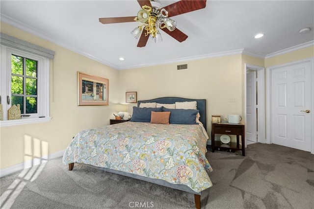 carpeted bedroom with a ceiling fan, visible vents, baseboards, recessed lighting, and ornamental molding