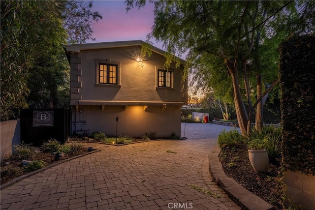 view of property exterior with fence