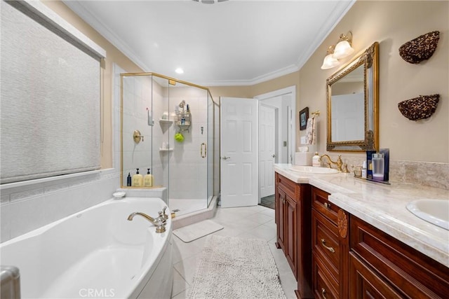 bathroom featuring double vanity, a sink, a shower stall, crown molding, and a bath