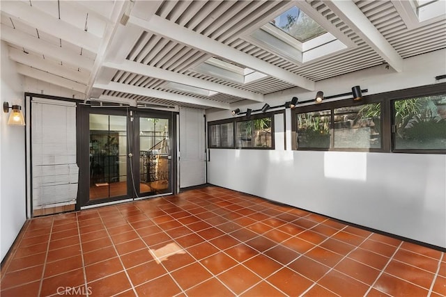 535 Mystic Way, Laguna Beach, CA 92651 - unfurnished sunroom featuring a skylight and beam ceiling