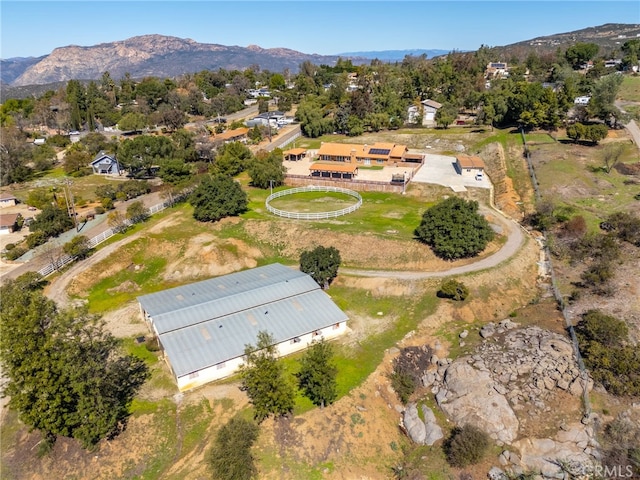 drone / aerial view featuring a mountain view