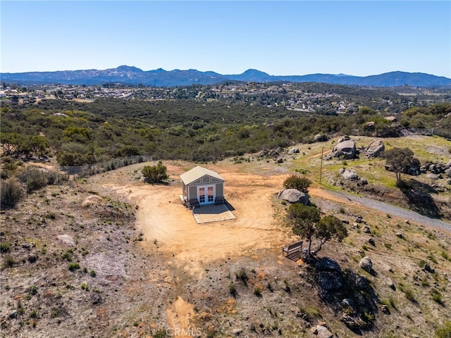 bird's eye view with a mountain view