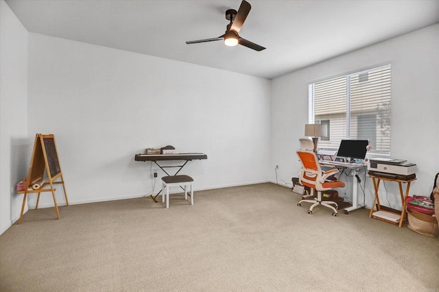 home office featuring a ceiling fan and carpet flooring