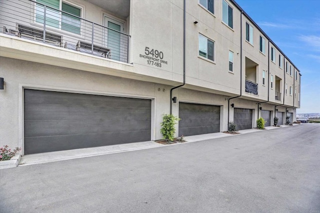 view of building exterior featuring a garage