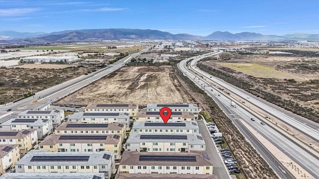 bird's eye view with a mountain view