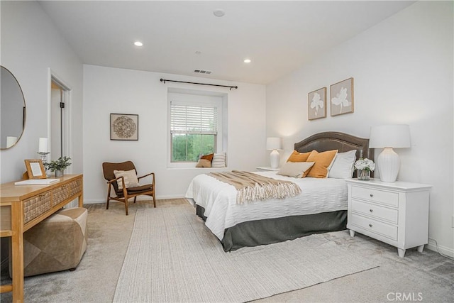 bedroom featuring recessed lighting, baseboards, light carpet, and visible vents