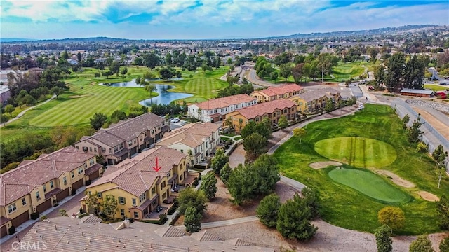 birds eye view of property with a residential view, a water view, and golf course view