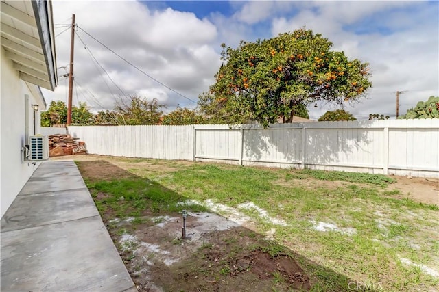 view of yard with a fenced backyard