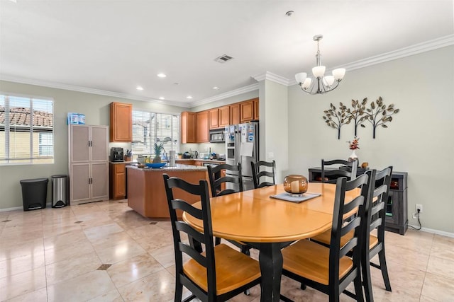 dining space featuring visible vents, a healthy amount of sunlight, crown molding, and an inviting chandelier