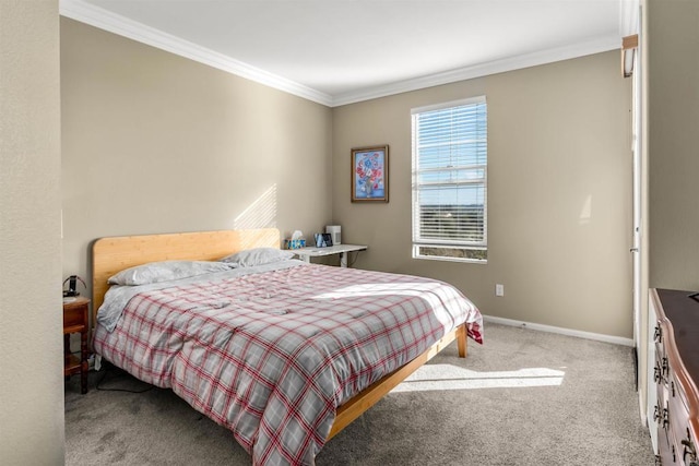 bedroom with baseboards, carpet floors, and ornamental molding