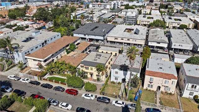 birds eye view of property with a residential view