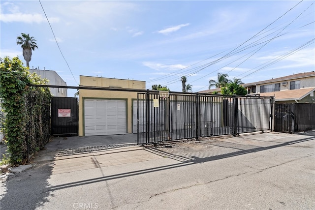 view of gate featuring fence