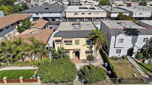 birds eye view of property with a residential view