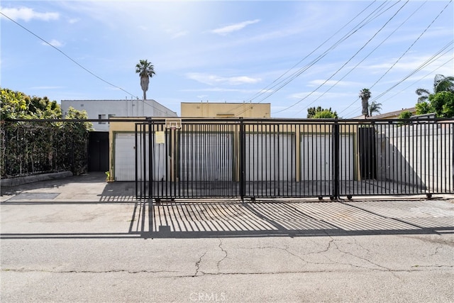 view of gate featuring fence