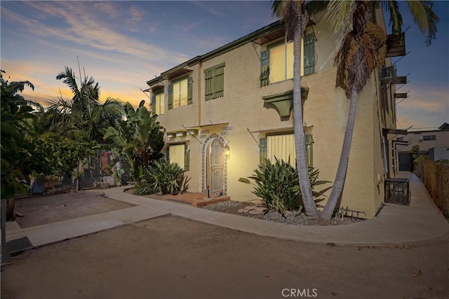 view of front of home featuring stucco siding