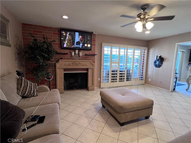 tiled living area with recessed lighting, a fireplace, baseboards, and ceiling fan