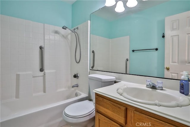 full bath featuring vanity, toilet, and bathing tub / shower combination