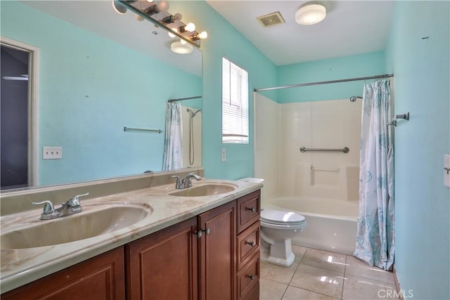 full bath with tile patterned flooring, visible vents, shower / bath combo, and a sink