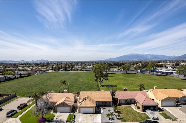 birds eye view of property featuring a residential view and a mountain view