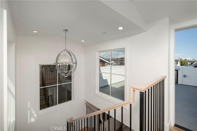 room details featuring recessed lighting and an inviting chandelier