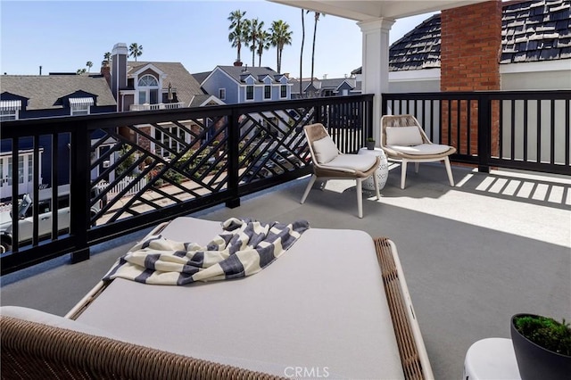 balcony featuring a residential view