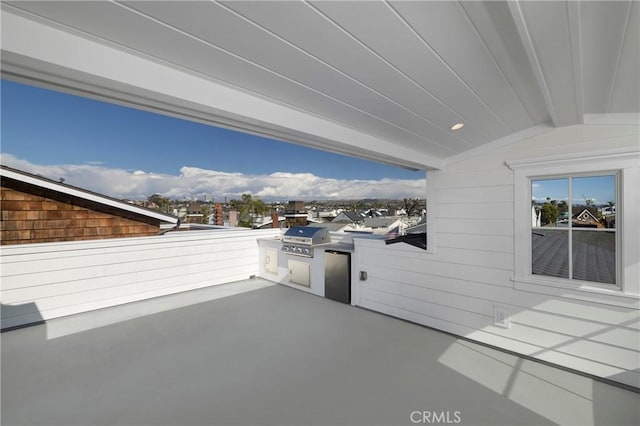 view of patio / terrace featuring area for grilling and an outdoor kitchen