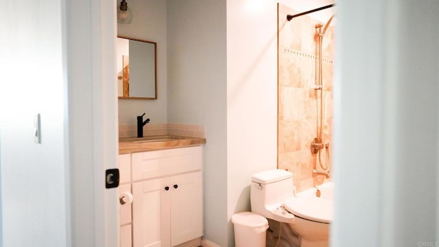 bathroom with shower / tub combination, toilet, and vanity