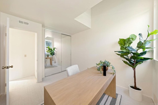 office area featuring carpet and visible vents