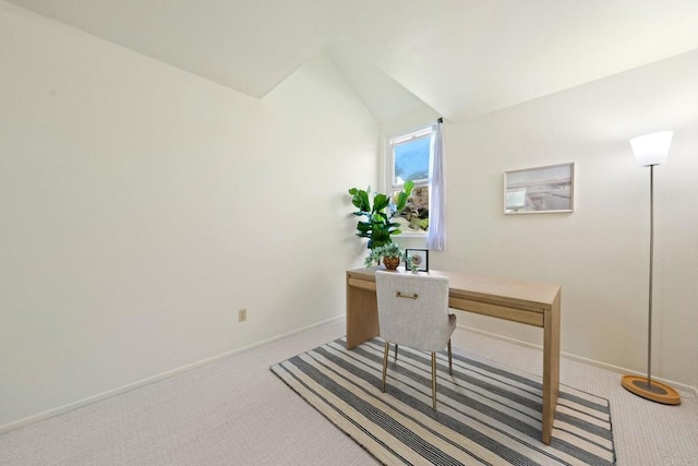 office area with baseboards, carpet, and lofted ceiling