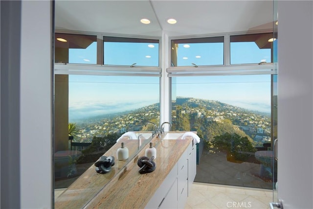 interior details featuring recessed lighting and a sink