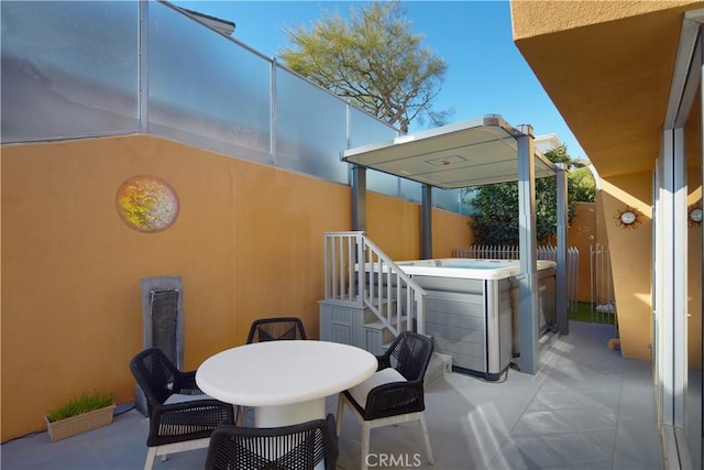 1415 Coral Dr, Laguna Beach, CA 92651 - view of patio with outdoor dining area, fence, and a hot tub