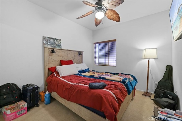 bedroom with multiple windows, carpet floors, and ceiling fan