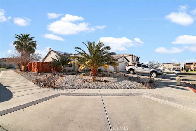 view of street with a residential view and sidewalks