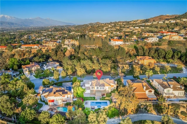 bird's eye view with a mountain view and a residential view
