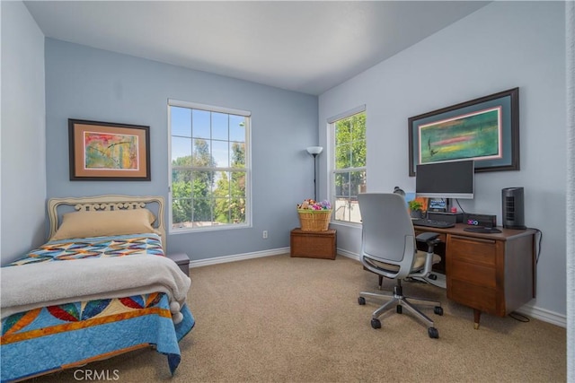 carpeted bedroom with baseboards