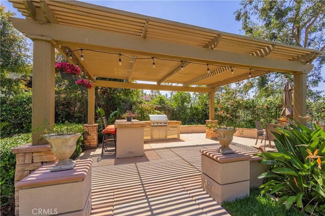 view of patio with a pergola, outdoor dining area, grilling area, and an outdoor kitchen