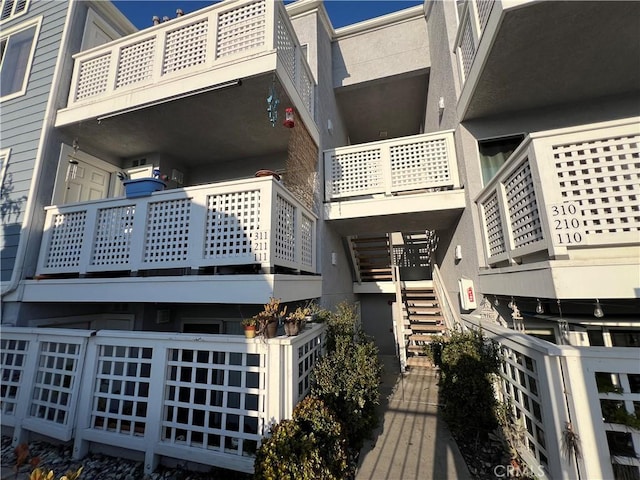 view of building exterior with stairs