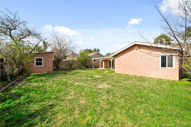 view of yard with fence