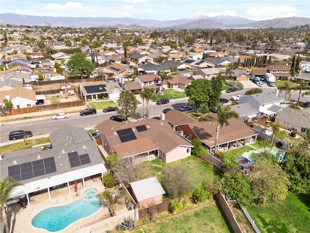 bird's eye view featuring a mountain view and a residential view