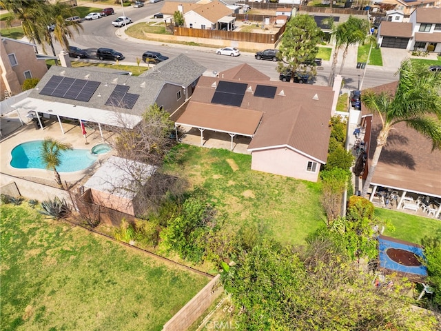 birds eye view of property with a residential view