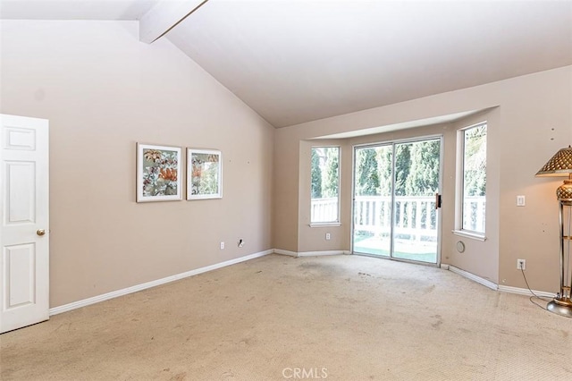 spare room featuring baseboards, light carpet, high vaulted ceiling, and beam ceiling