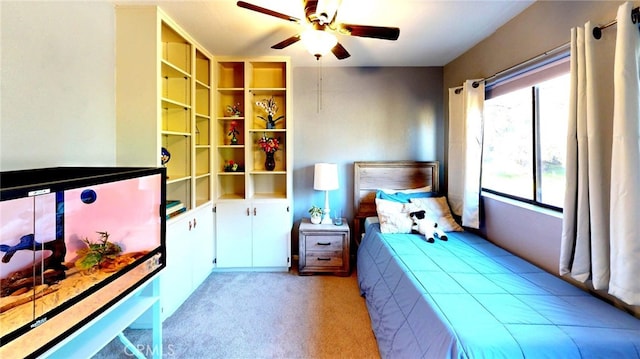 bedroom with light carpet and ceiling fan