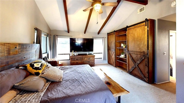 bedroom with visible vents, a ceiling fan, lofted ceiling with beams, a barn door, and light colored carpet