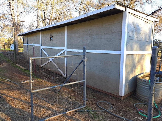 view of outbuilding featuring an outdoor structure